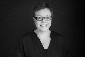 county durham family photographer portrait of woman holding a camera wearing black