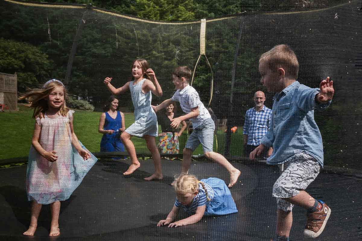 children bouncing on a trampoline